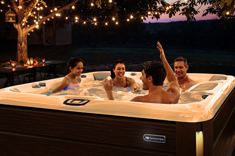 people enjoying an Exclusive Spas from Emerald Pool & Patio